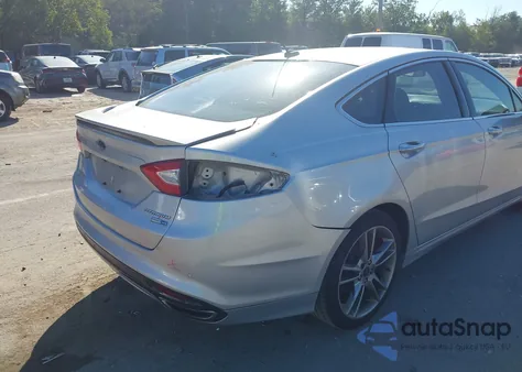 2016 Ford Fusion Titanium z USA, uszkodzony, nr VIN 3FA6P0D97GR138228